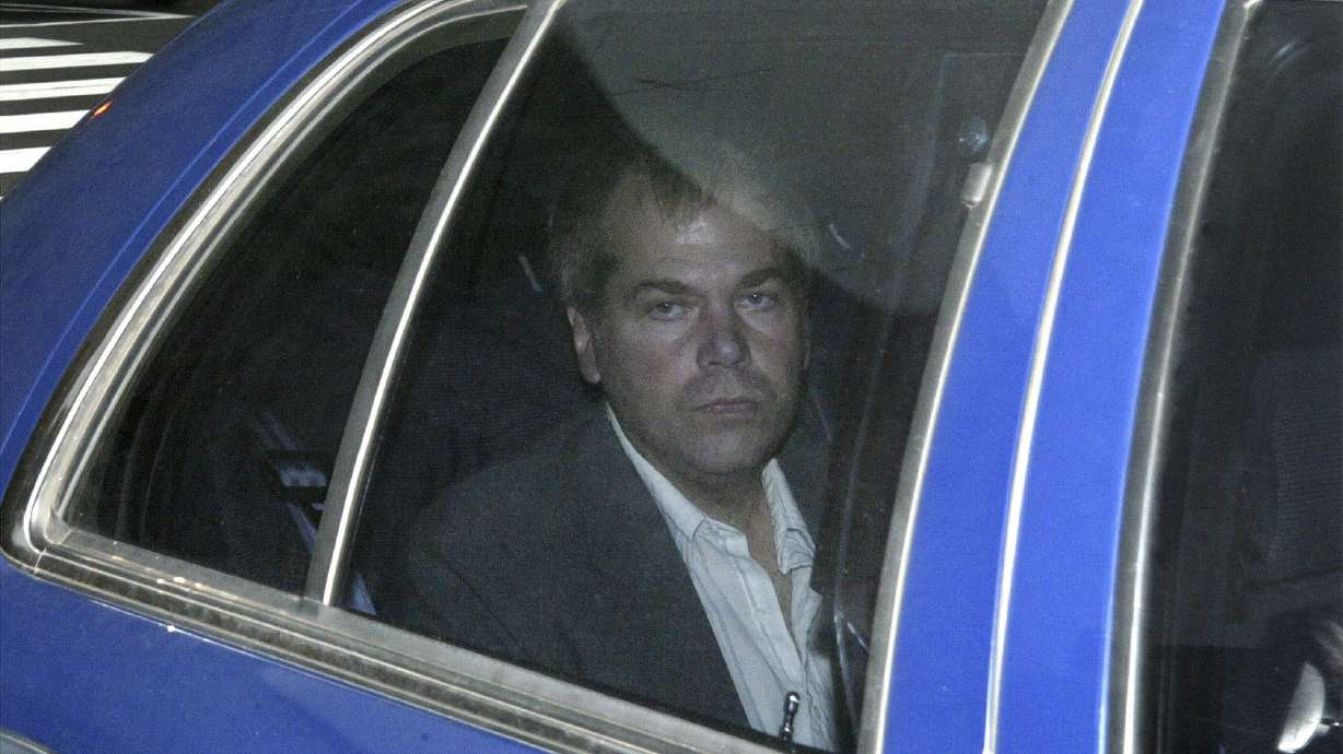 John Hinckley Jr. arrives at U.S. District Court in Washington Nov. 18, 2003. A federal judge said Monday that Hinckley can be freed from all his remaining restrictions next year if he continues to follow the rules and remains mentally stable.
