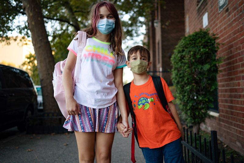 Special needs children Gianna Tesoriero, 11 and Roberto Tesoriero, 7, pose for a portrait in Brooklyn on Sept. 20.