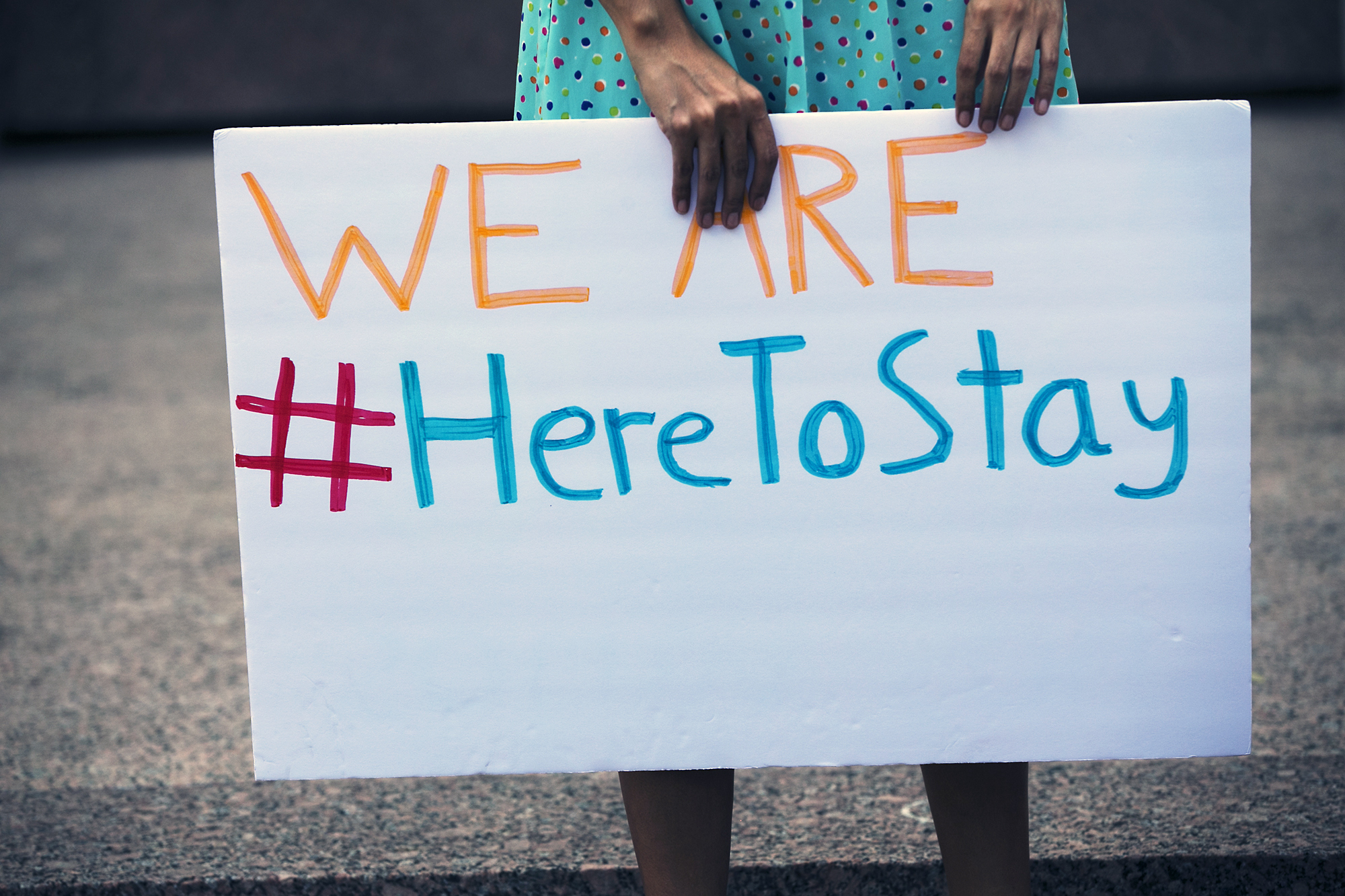 People gathered at the J.J.Pickle federal Building to protest Pres. Trump's decision to rescind DACA Sept. 5, 2017. The Biden administration on Monday renewed efforts to shield hundreds of thousands of immigrants who came to the U.S. as young children from deportation.