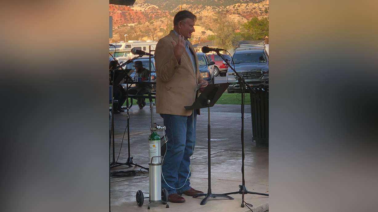State Sen. Evan Vickers, R-Cedar City, speaks at a Cedar Area Interfaith Alliance community prayer gathering at Main Street Park hooked up to oxygen while recovering from COVID-19, Cedar City Thursday.
