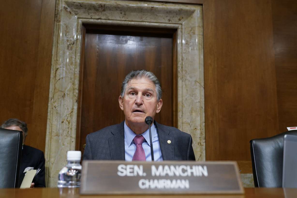 Sen. Joe Manchin, D-W.Va., arrives to chair the Senate Energy and Natural Resources Committee, as congressional Democrats speed ahead this week in pursuit of President Joe Biden's $3.5 trillion plan for social and environmental spending, at the Capitol in Washington, on Sept. 21. Manchin, a Democratic senator vital to the bill's fate, has balked at the price tag.
