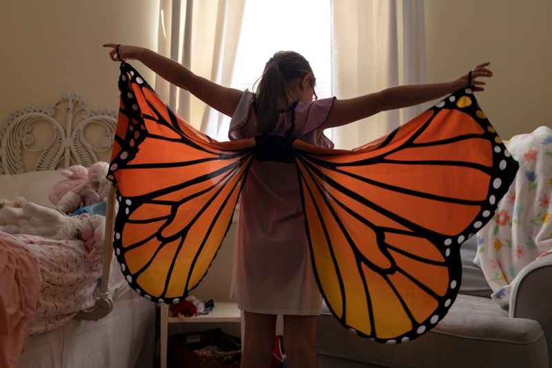 Ella Rose Corley, 8, who contracted an infection in early childhood that left her legally blind, plays in her bedroom in Vestavia Hills, Ala., on Saturday.