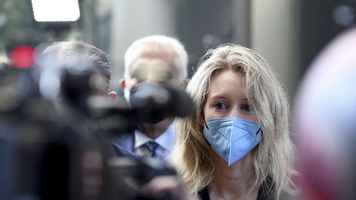 Elizabeth Holmes, founder and CEO of Theranos, arrives at the federal courthouse for jury selection in her trial, in San Jose, Calif, on Aug. 31.