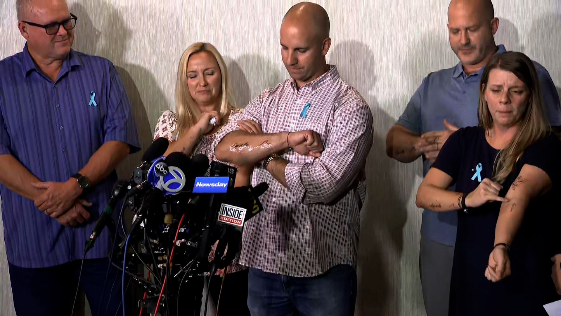 Gabby Petito's parents and stepparents showed they got matching tattoos in her memory at a news conference on Tuesday.