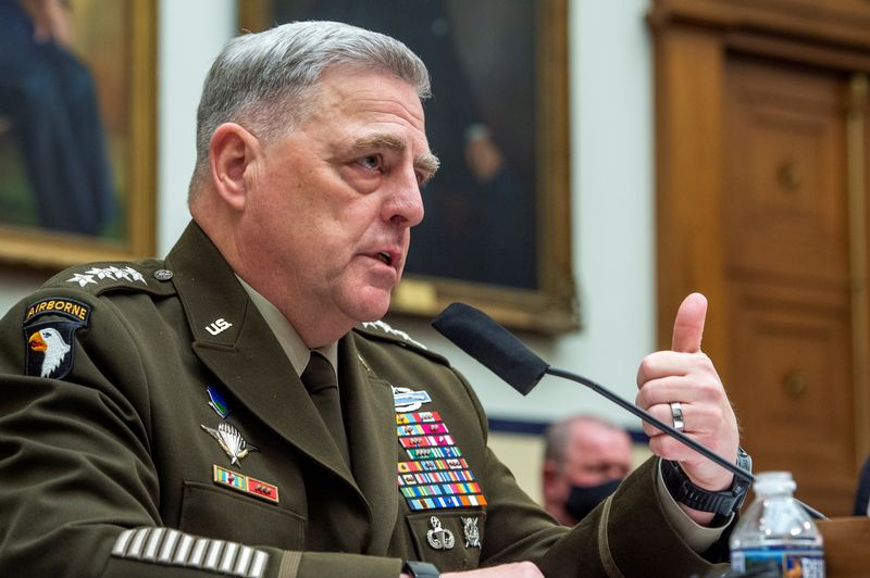 Chairman of the Joint Chiefs of Staff, Army General Mark A. Milley, responds to questions during a House Armed Services Committee hearing on "Ending the U.S. Military Mission in Afghanistan" in the Rayburn House Office Building in Washington, Wednesday.