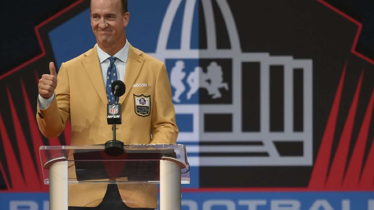 Peyton Manning, a member of the Pro Football Hall of Fame Class of 2021, speaks during the induction ceremony at the Pro Football Hall of Fame on Aug. 8, in Canton, Ohio. Manning,
kicked off the annual user summit Wednesday for Utah financial technology innovator MX.