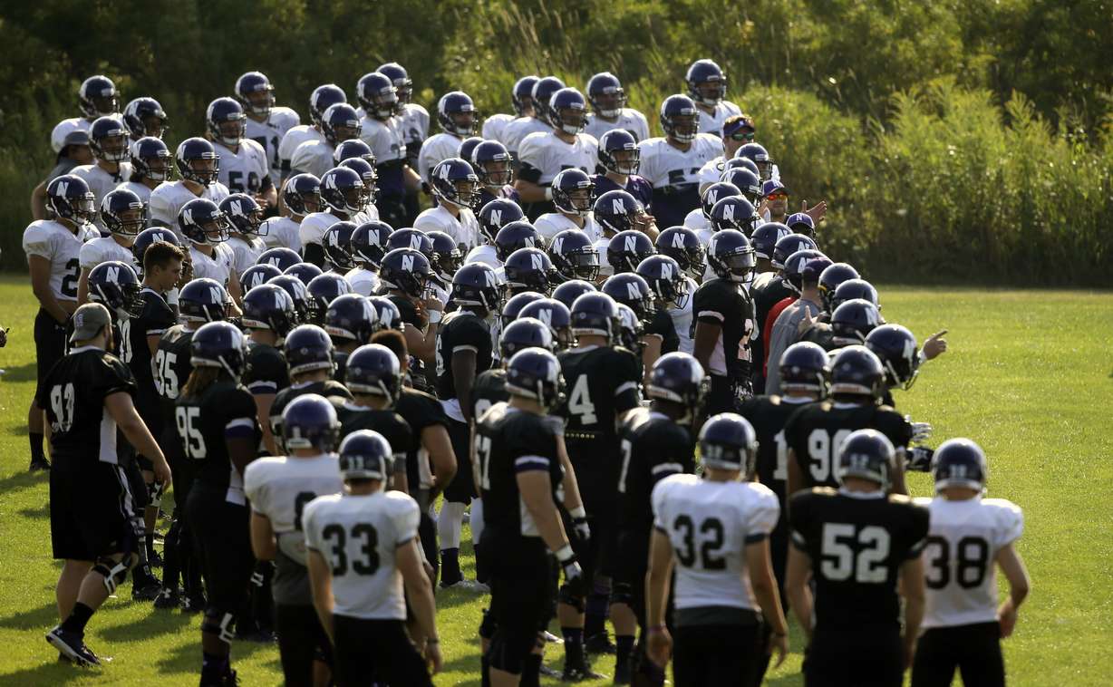 Northwestern football players gather during practice at the University of Wisconsin-Parkside campus in Kenosha, Wisc., in this Monday, Aug. 17, 2015, file photo. The Wildcats have an opening Sept. 2, 2023; could they play a first-ever football game with BYU after the Cougars lost their 2023 opener in Tennessee?
