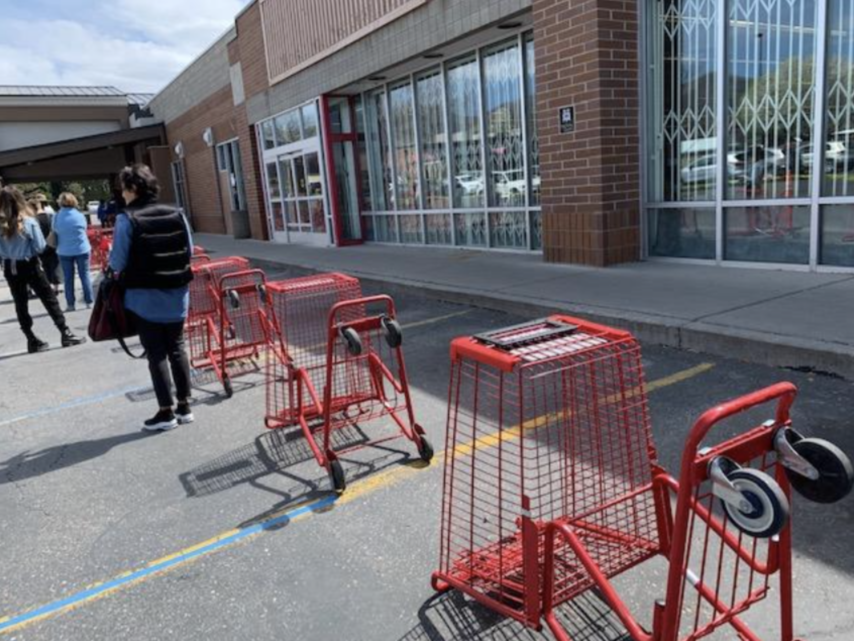 Trader Joe's social distancing measures to ensure shoppers maintain safe distance at store during COVID-19 pandemic on April 9, 2020. The image is one of over 1,000 items in the Marriott Library's "Utah COVID-19" digital collection.