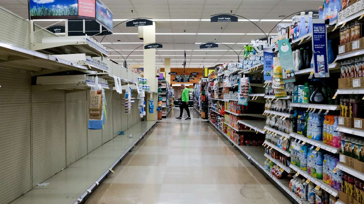 Shelves that once contained toilet paper are empty at a Smith’s grocery store in Salt Lake City on March 17, 2020. Images like this and written and oral histories about the pandemic are being collected in Utah to ensure the events are documented and accessible decades from now.