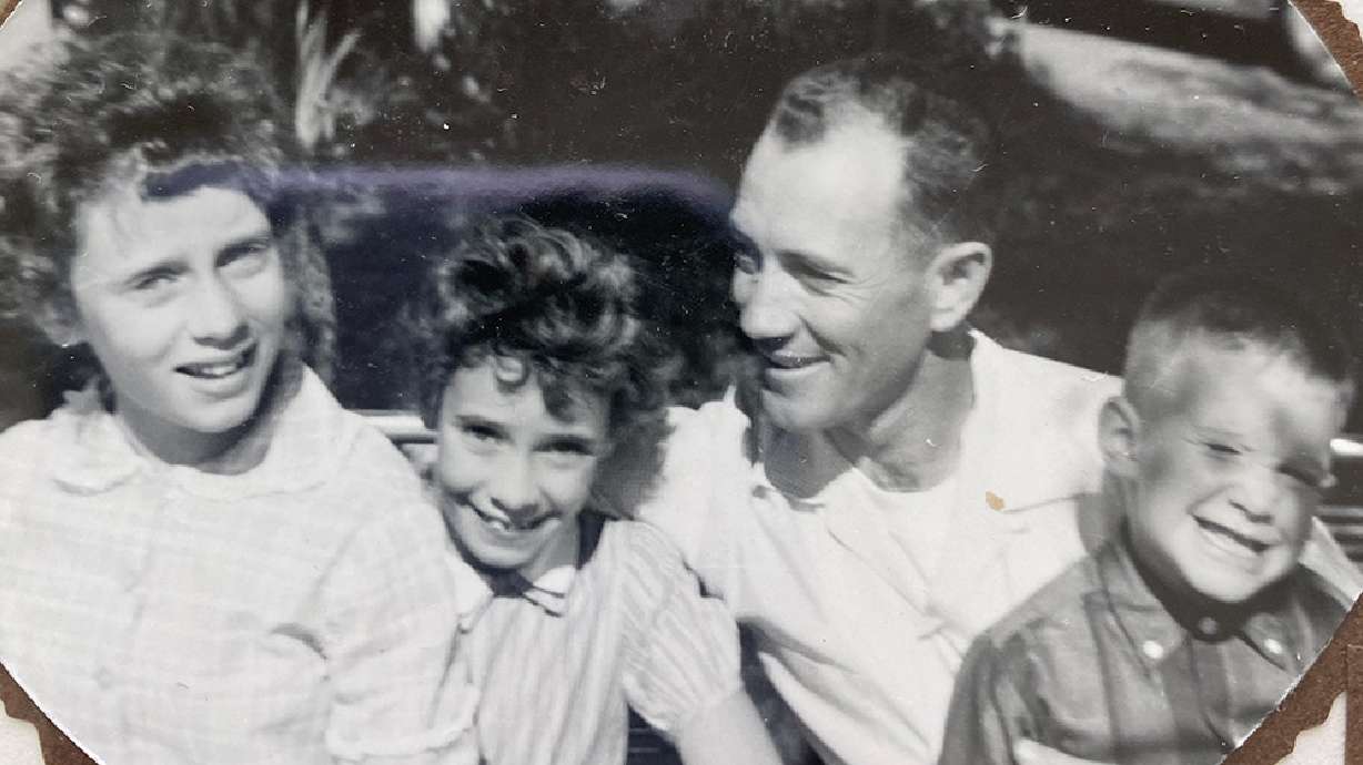 Raymond Jones poses with his two daughters and son Jeffrey Jones. Raymond's body was recently found after he disappeared 53 years ago.