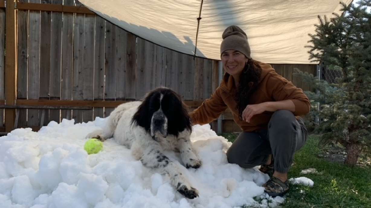 Early fall in Utah usually doesn't bring blizzards, but for Maggie, pictured with owner Marianna Wilson, to complete a final bucket list item meant one last jump in the snow with the help of a local ice rink.