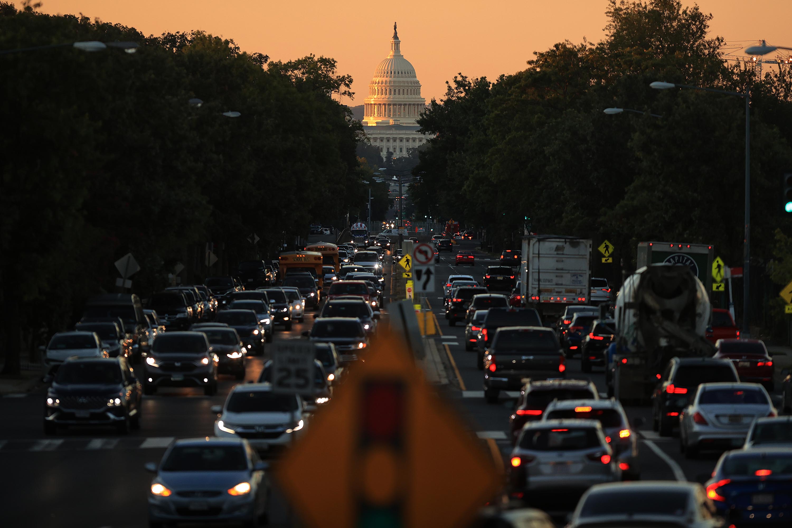 Sunrise hits the U.S. Capitol dome on Thursday in Washington, D.C. Nearly 4,000 federal employees are off the job on Friday because Congress failed to extend highway funding, a Transportation Department spokesperson told CNN.