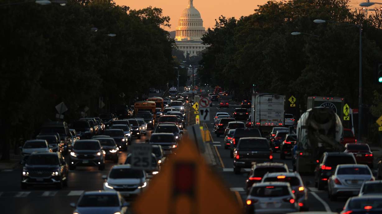 Sunrise hits the U.S. Capitol dome on Thursday in Washington, D.C. Nearly 4,000 federal employees are off the job on Friday because Congress failed to extend highway funding, a Transportation Department spokesperson told CNN.