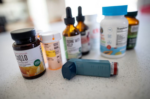 Medications and supplements that Ashley Blackburn and
her daughter, Emery, 9, are taking to deal with their long-haul
COVID-19 symptoms are photographed at their home in South Jordan on Sept. 14.