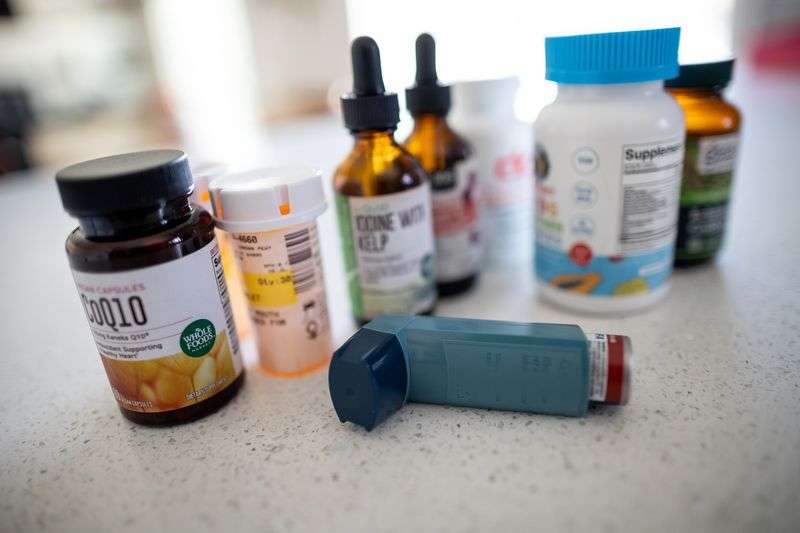 Medications and supplements that Ashley Blackburn and
her daughter, Emery, 9, are taking to deal with their long-haul
COVID-19 symptoms are photographed at their home in South Jordan on Sept. 14.