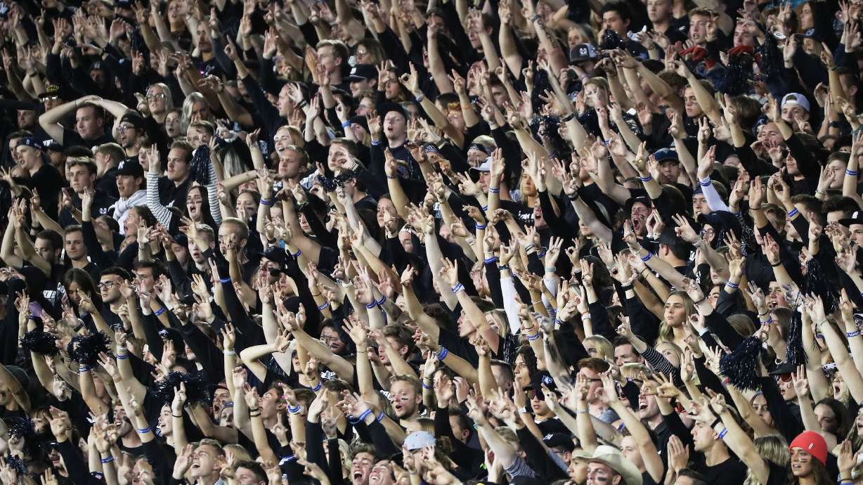 Utah State Aggies fans cheer in Logan on Friday, Oct. 1, 2021.