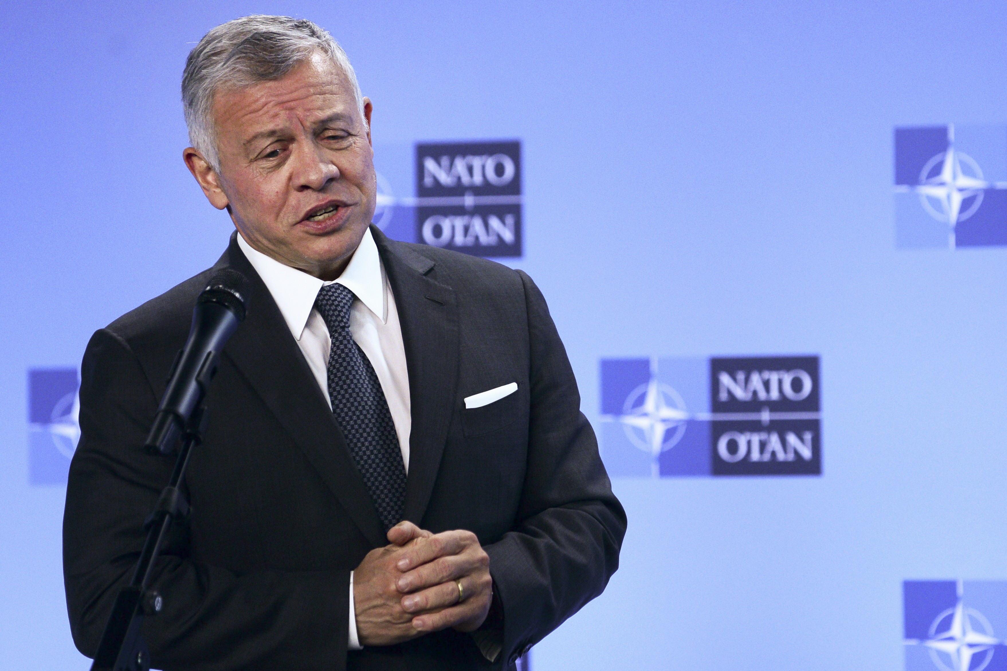 Jordan's King Abdullah II speaks at NATO headquarters in Brussels on May 5. Hundreds of world leaders, politicians, billionaires, celebrities, religious leaders and drug dealers have been stashing away their investments in mansions, exclusive beachfront property, yachts and other assets for the past quarter-century, according to a review of nearly 12 million files obtained from 14 different firms located around the world.