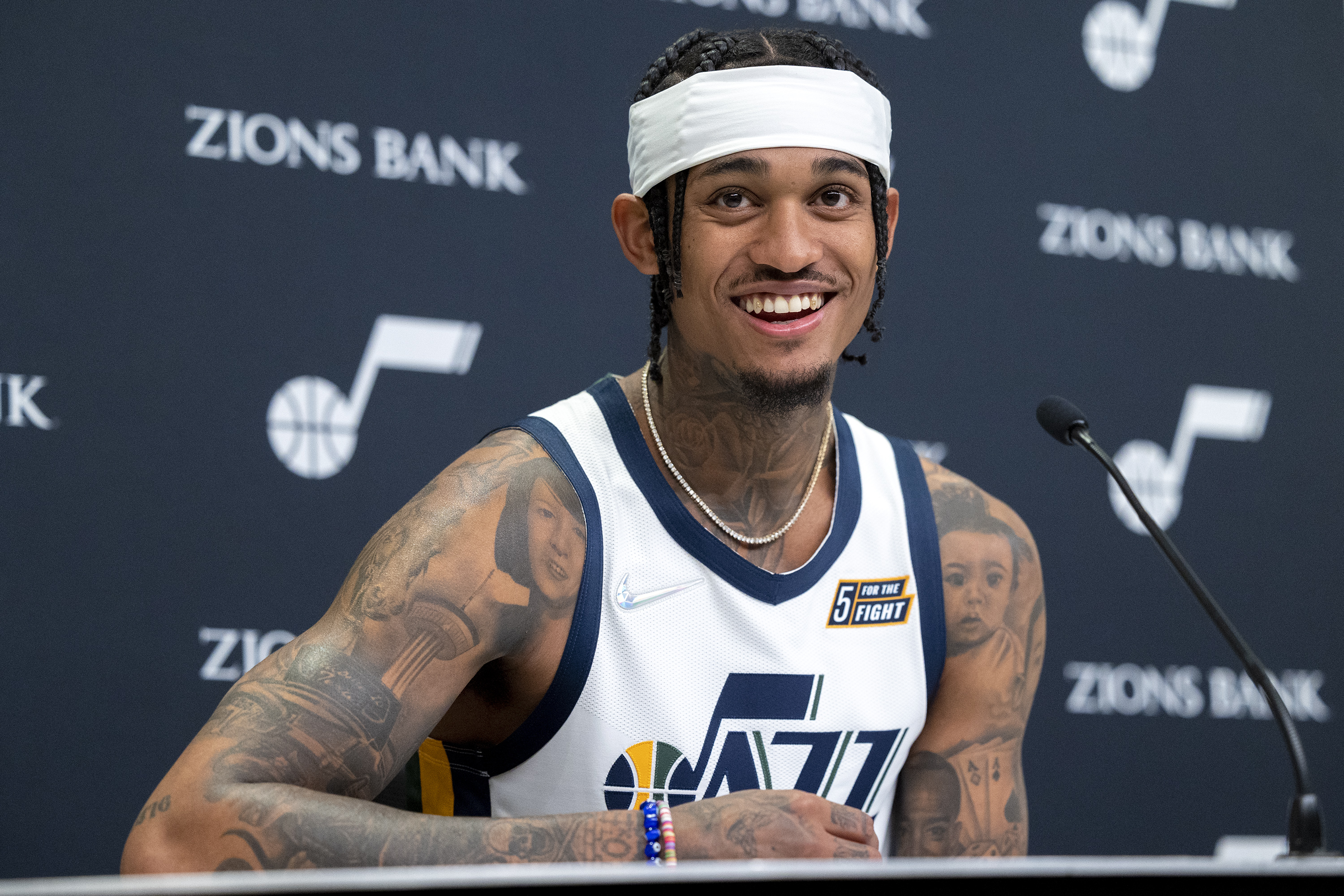 Utah Jazz guard Jordan Clarkson (00) talks during the Utah Jazz media media day at Vivint Arena in Salt Lake City on Monday, Sept. 27, 2021.