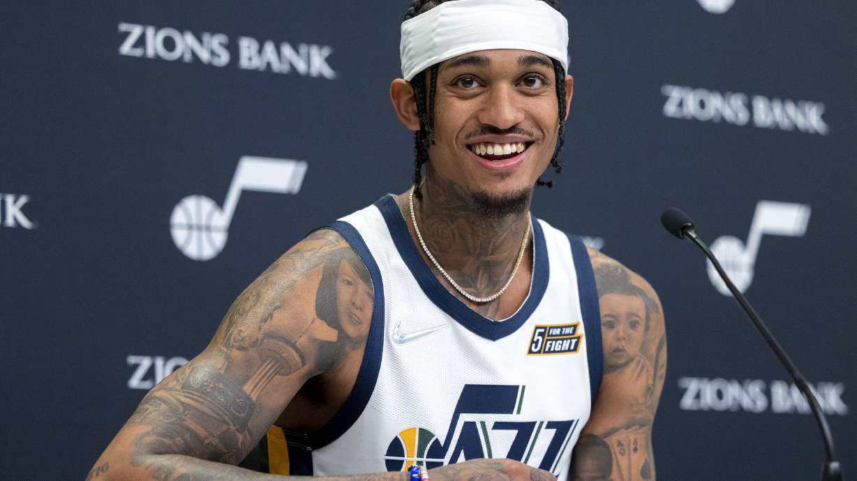Utah Jazz guard Jordan Clarkson (00) talks during the Utah Jazz media media day at Vivint Arena in Salt Lake City on Monday, Sept. 27, 2021.