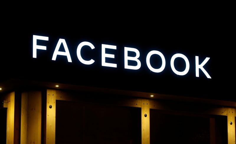 The logo of Facebook is seen in Davos, Switzerland, in January 2020. A Facebook whistleblower on Sunday accused the social media giant of repeatedly prioritizing profit over clamping down on hate speech and misinformation and said her lawyers have filed at least eight complaints with the U.S. Securities and Exchange Commission.