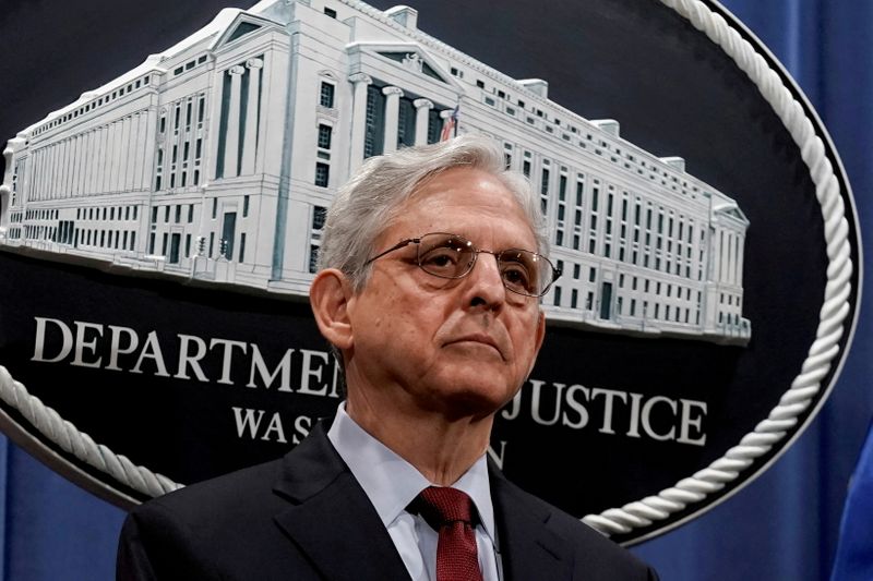 U.S. Attorney General Merrick Garland attends a news conference at the Department of Justice in Washington, D.C., June 25. He said on Monday said the Justice Department is "seriously and urgently investigating" how states are changing voting procedures.