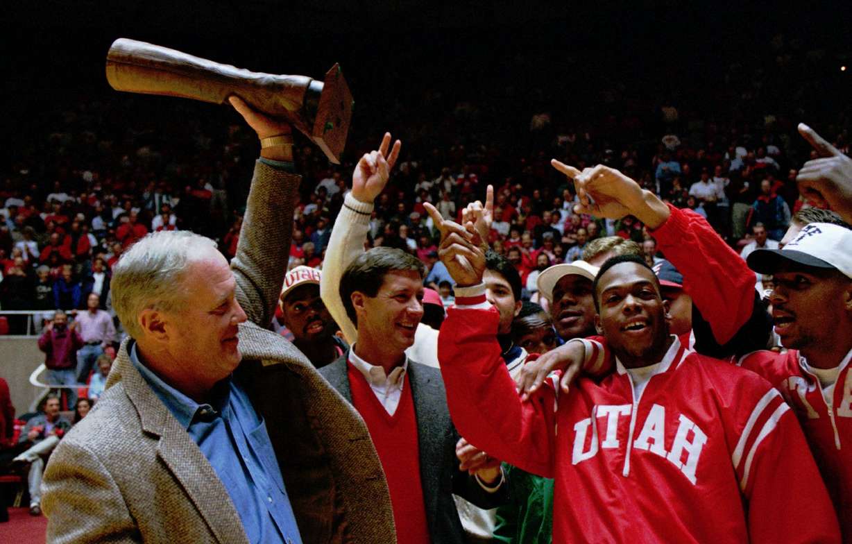 Utah football coach Ron McBride is presented with the Beehive Boot, Sept. 18, 2002 in Salt Lake City.