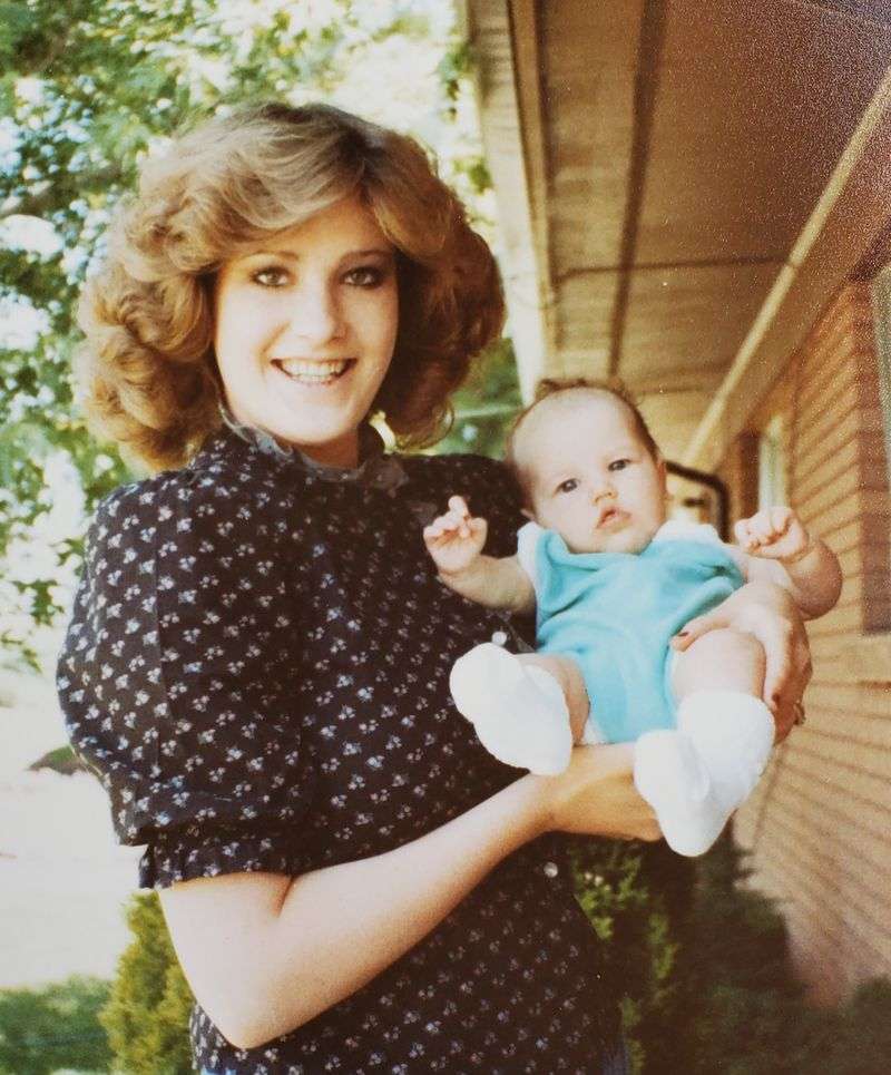Brenda Lafferty holds her daughter, Erica Lafferty, on
Sunday, June 5, 1983, about one year before their murder. That day,
Erica was blessed by her father, Allen Lafferty.