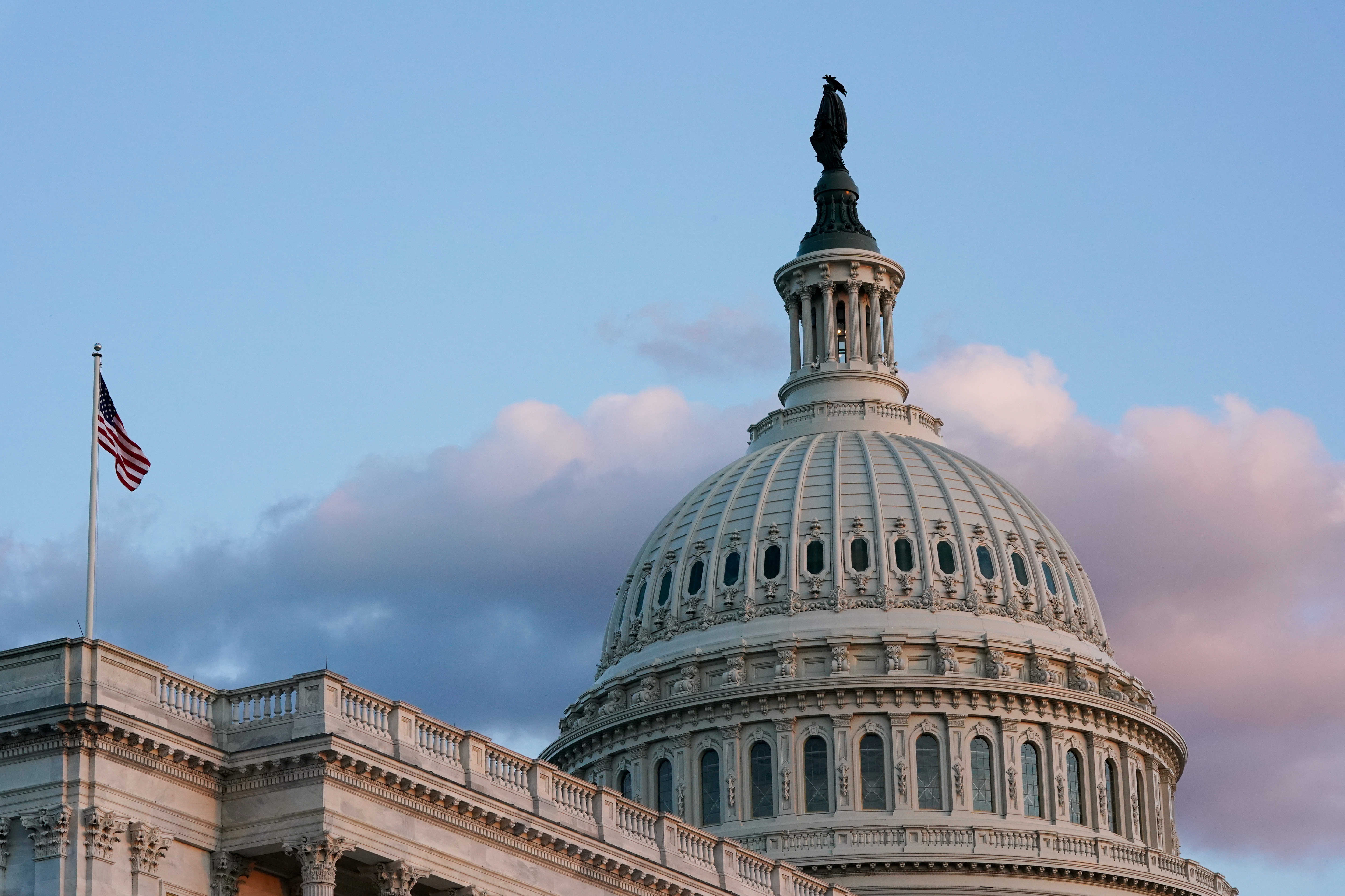 The U.S. Capitol building on Capitol Hill, seen during sunset in Washington, Sunday. On Wednesday the senators intend to hold a procedural vote on a bill — opposed by Republicans — to suspend the borrowing limit through the end of 2022.