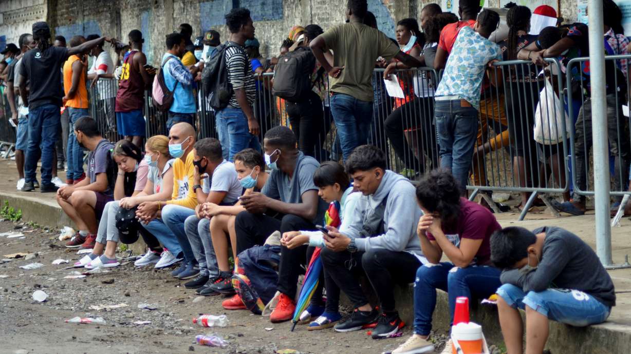 Migrants from Central America, Haiti and Cuba queue outside the Mexican Commission for Refugee Assistance to apply for asylum and refugee status in Mexico, in Tapachula, Mexico, on May 6.