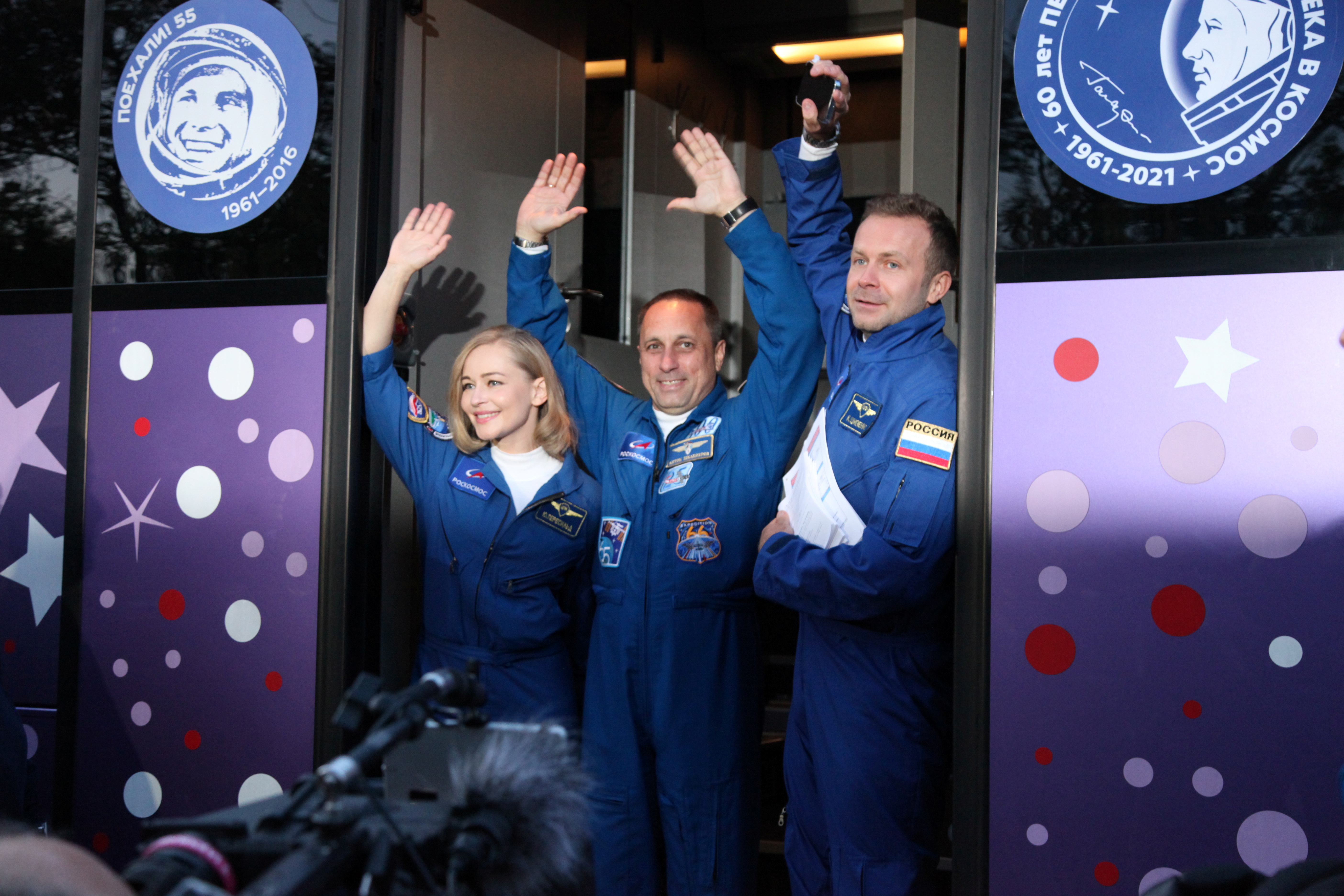 The International Space Station crew members Russian cosmonaut Anton Shkaplerov, film director Klim Shipenko and actress Yulia Peresild wave as they leave to board the spacecraft shortly before the launch at the Baikonur Cosmodrome, Kazakhstan on Tuesday.