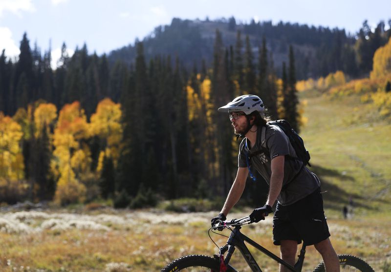 Isaac Miller bikes at Solitude Mountain Resort in Big
Cottonwood Canyon on Oct. 1.