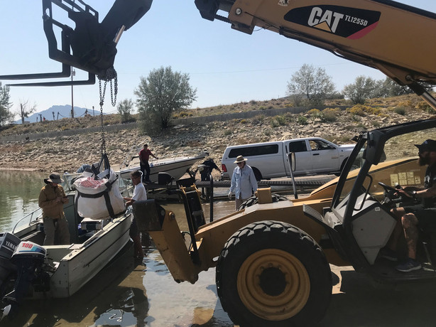 Crews unload the ichthyosaur block found in Flaming Gorge at the Lucerne Valley Marina near Manila, Daggett County, on Sept. 8, 2021.