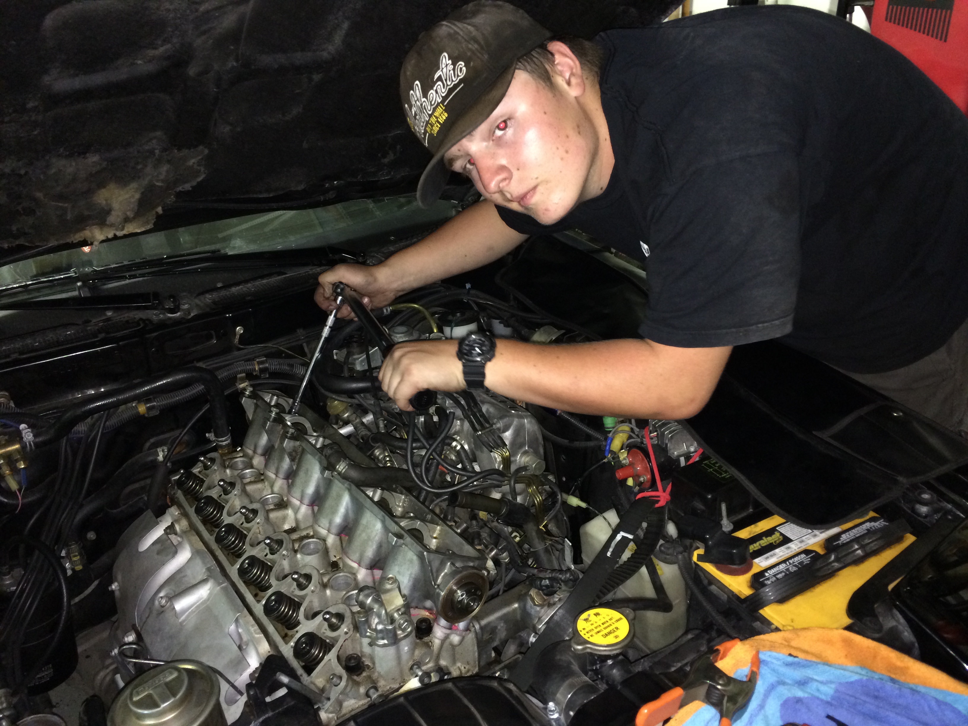 Devin Dresser working on his 1982 Toyota Celica Supra he rebuilt with his father, Daniel Dresser. In buying and building the Celica, Daniel gave his son the same experience he had of bonding with a father over the rebuild of a car. Now, their car travels to shows and similarly unites generations.