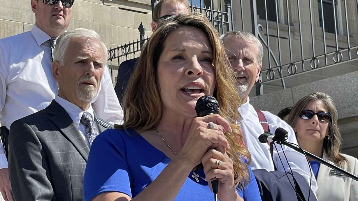 Republican Lt. Gov. Janice McGeachin addresses a rally on the Statehouse steps in Boise on Sept. 15. Mainstream Idaho Republicans concerned about a takeover by the surging far-right wing of the party are asking Democrats, Independents or other affiliated voters to register as Republicans to vote in the party's May primary.