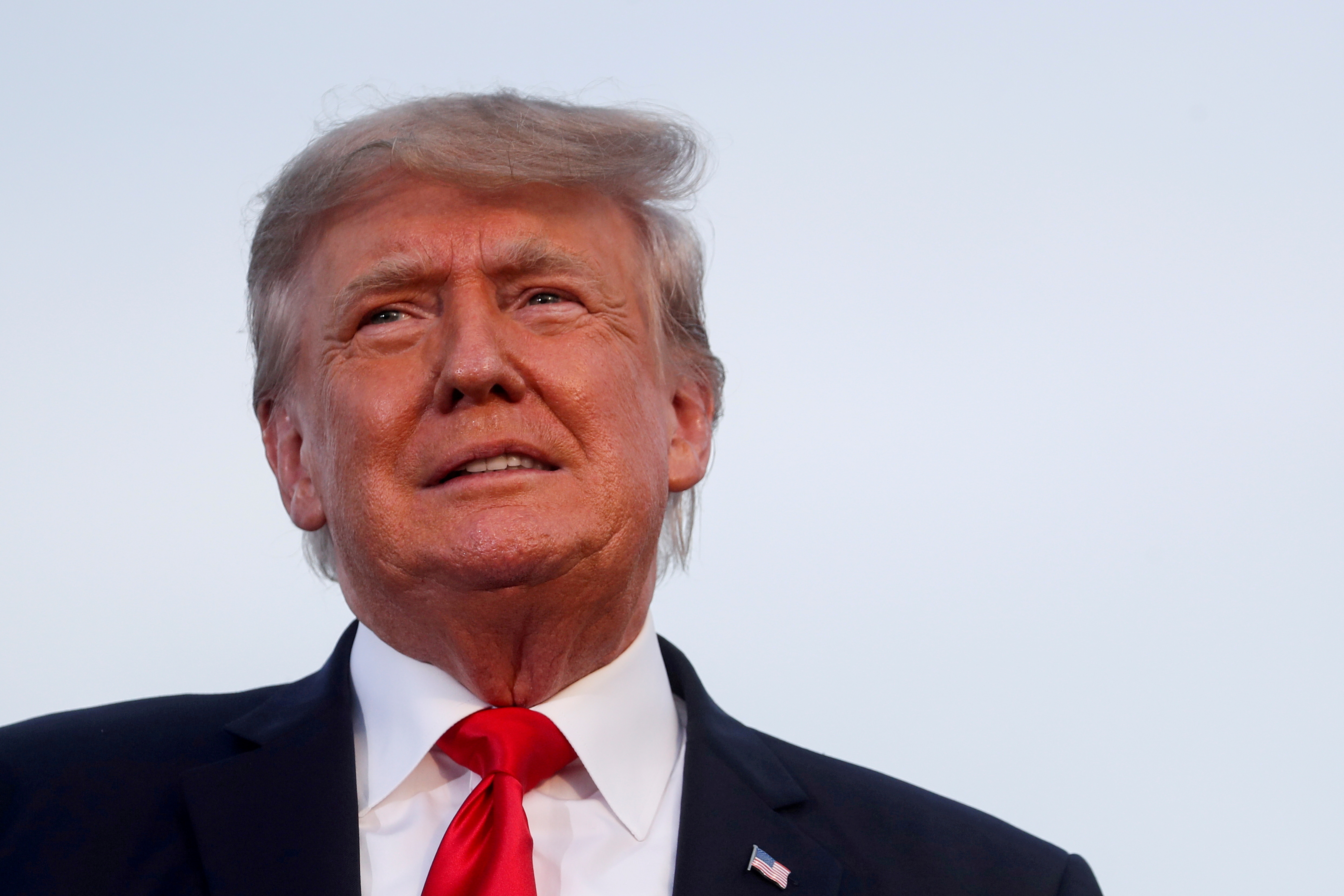 Former U.S. President Donald Trump looks on during his first post-presidency campaign rally in Wellington, Ohio, on June 26. A review by U.S. Senate Democrats of Donald Trump's attempt to use the Justice Department to overturn his 2020 election defeat provided new details on the effort to advance Trump's false claims.