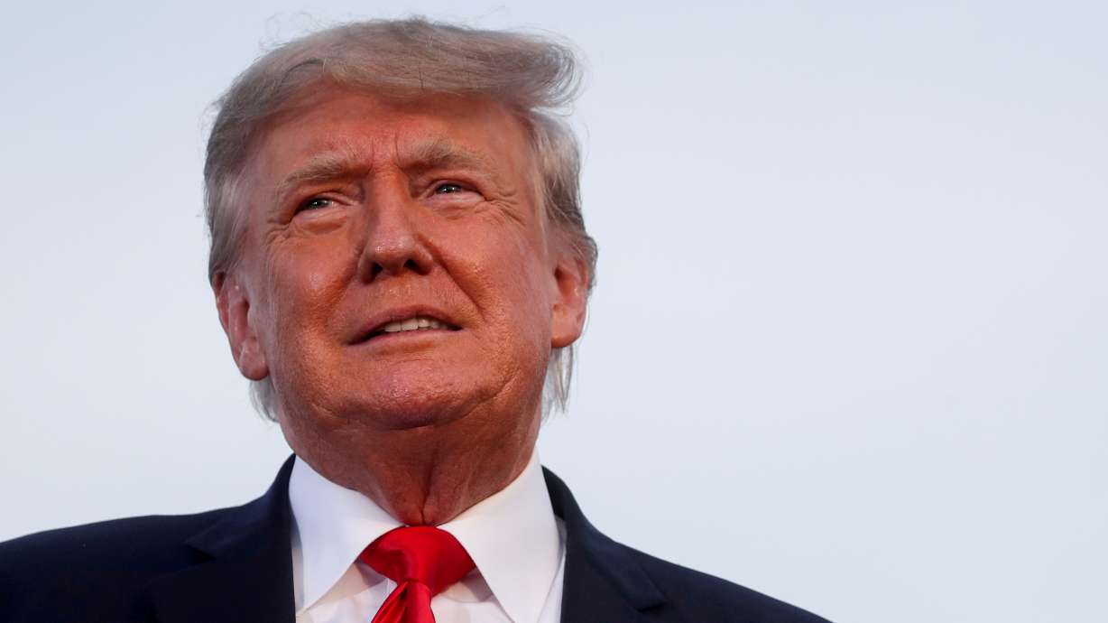 Former U.S. President Donald Trump looks on during his first post-presidency campaign rally in Wellington, Ohio, on June 26. A review by U.S. Senate Democrats of Donald Trump's attempt to use the Justice Department to overturn his 2020 election defeat provided new details on the effort to advance Trump's false claims.