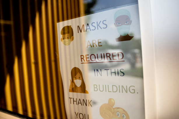 Signage indicates that masks are required inside Nibley Park School in Salt Lake City on Tuesday, Aug. 24, 2021.