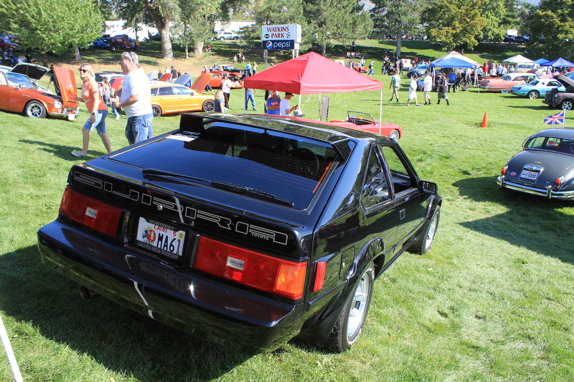 Devin Dresser's 1982 Toyota Celica Supra soaking up the sun at the Peach Days Car Show in September 2021. In buying and building the Celica, Devin's father, Daniel, gave his son the same experience he had of bonding with a father over the rebuild of a car. Now, their car travels to shows and similarly unites generations.