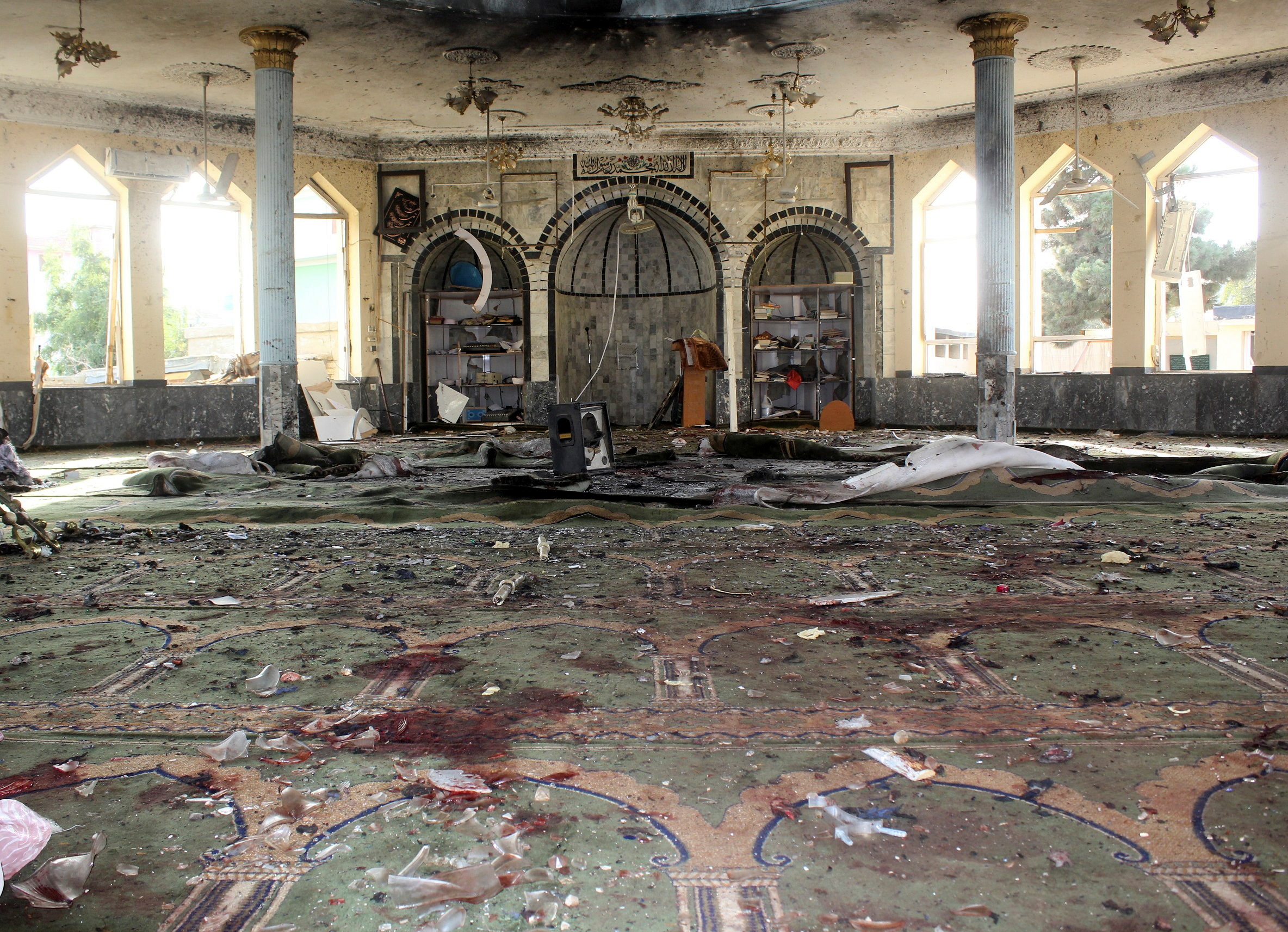 A view shows a mosque after a blast, in Kunduz, Afghanistan on Friday. A suicide bomber attacked a mosque in Afghanistan's northeastern Kunduz province on Friday, killing scores of worshippers in the country's third attack this week on a religious institution.