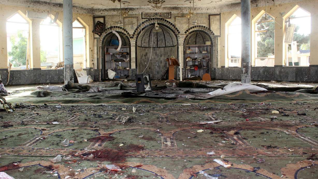 A view shows a mosque after a blast, in Kunduz, Afghanistan on Friday. A suicide bomber attacked a mosque in Afghanistan's northeastern Kunduz province on Friday, killing scores of worshippers in the country's third attack this week on a religious institution.