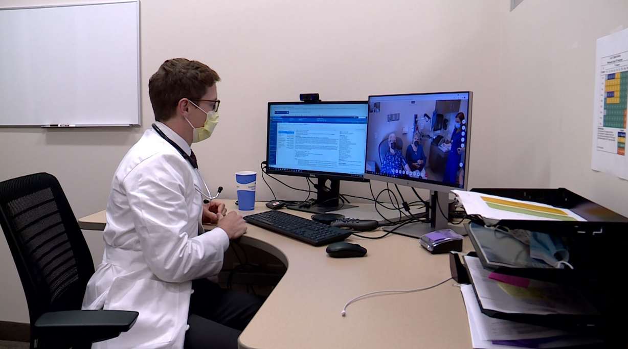 Dr. David Gill, an oncologist with Intermountain Healthcare, uses TeleHealth to visit with his patient, Frank Severson who was diagnosed with metastatic melanoma. It saves Severson a couple hours of drive time for each appointment. Gill says they use state-of-the-art technology that allows him to zoom in close to examine a patient’s rash or to look at reports.