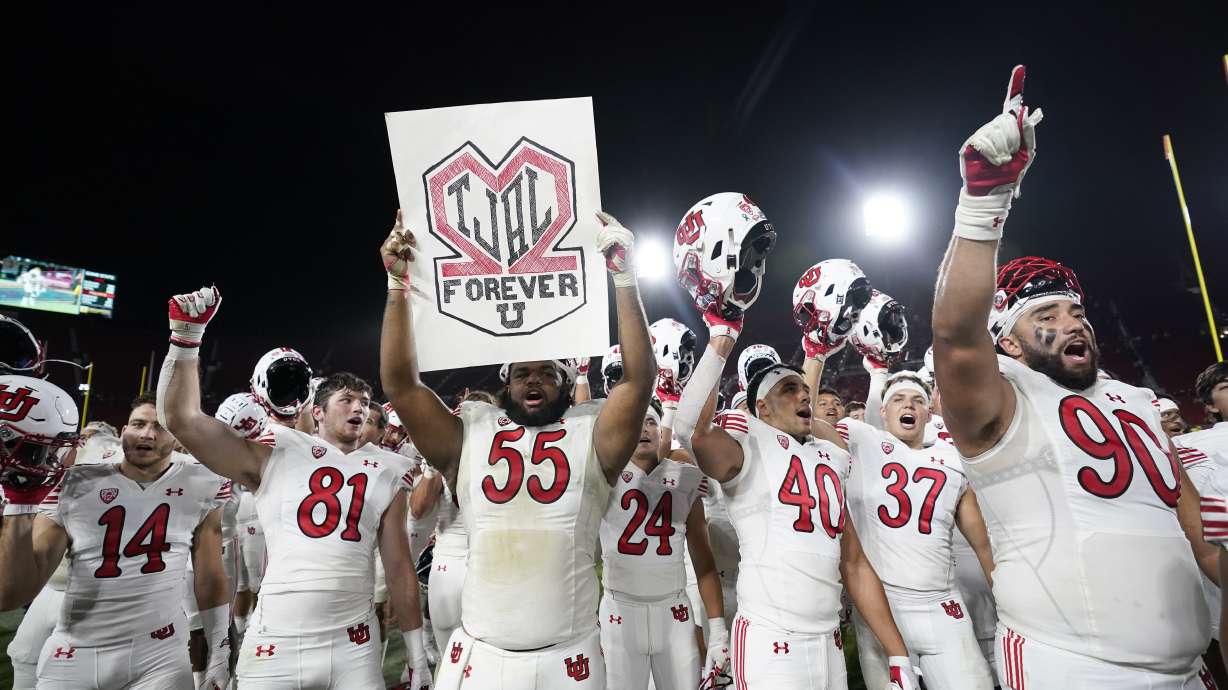 Utah players celebrate a win over Southern California in an NCAA college football game Saturday, Oct. 9, 2021, in Los Angeles.