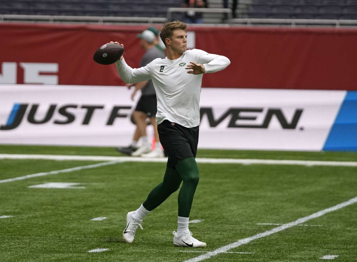 New York Jets quarterback Zach Wilson (2) warms-up before an NFL football game between the New York Jets and the Atlanta Falcons at the Tottenham Hotspur stadium in London, England, Sunday, Oct. 10, 2021.