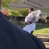 Have You Seen This? Groom carries bride's twin sister who has disability down the aisle