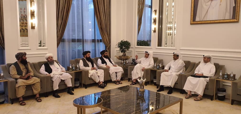 Taliban delegates meet with Qatar delegates in Doha, Qatar, in this handout photo uploaded to social media on Saturday.