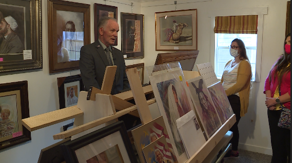 JR Johansen with some of his paintings, Friday.