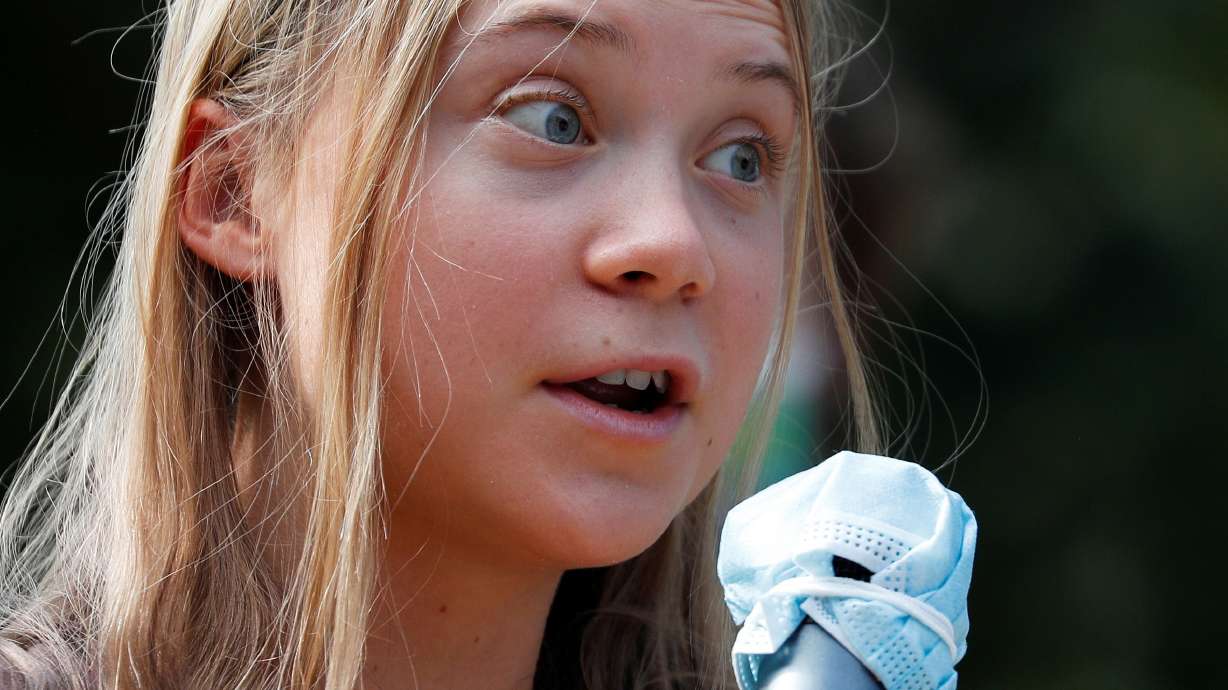 Climate activist Greta Thunberg speaks as she joins students holding a Fridays for Future climate strike while environment ministers meet ahead of Glasgow's COP26 meeting, in Milan, Italy, Oct. 1. A U.N. panel said on Monday it could not immediately rule on a complaint by Swedish teenager Greta Thunberg and others that state inaction on climate change violates children's rights.