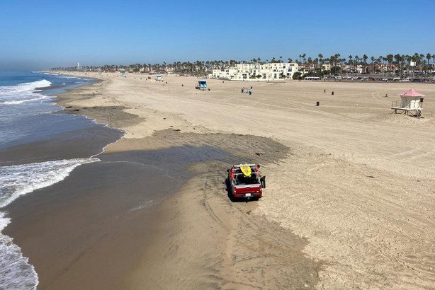 Few people visit the beach a week after the ocean was closed to surfing and swimming due to an offshore pipeline leak in Huntington Beach, Calif., Sunday. Access the Ocean water has been shut to surfing and swimming for a week since an offshore oil pipeline leaked crude into the water off the coast of Orange County.
