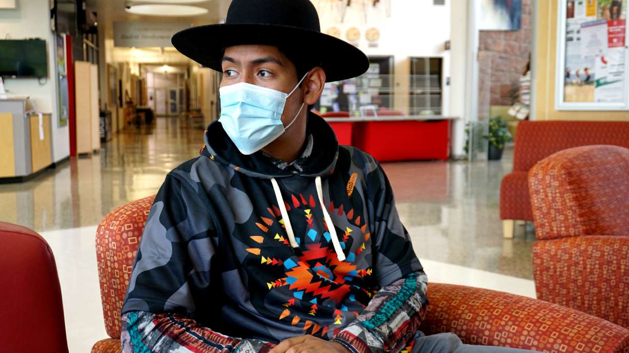 Isiah Cambridge reflects on what Indigenous People's Day means to him as a member of the Northern Ute Tribe while at an art gallery at the University of Utah celebrates Indigenous People's Day on Monday.