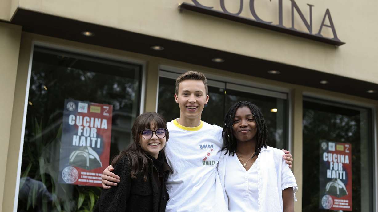 Herriman High School students Sofia Ampudia, left, Clark Fiedler and Ashinti St. Clair are photographed at Cucina in Salt Lake City on Wednesday. The students have formed Union for Haiti and have partnered with Cucina to raise money to buy 1,000 tents for people living in Haiti.